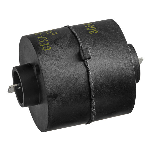 A black Manitowoc Ice motor start plug with a metal cylinder inside.