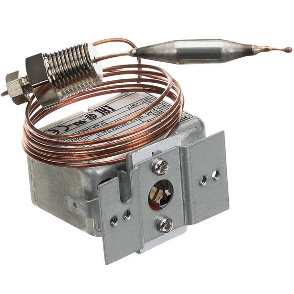 A metal device with a wire attached, the Crown Steam Hi-Limit Thermostat.