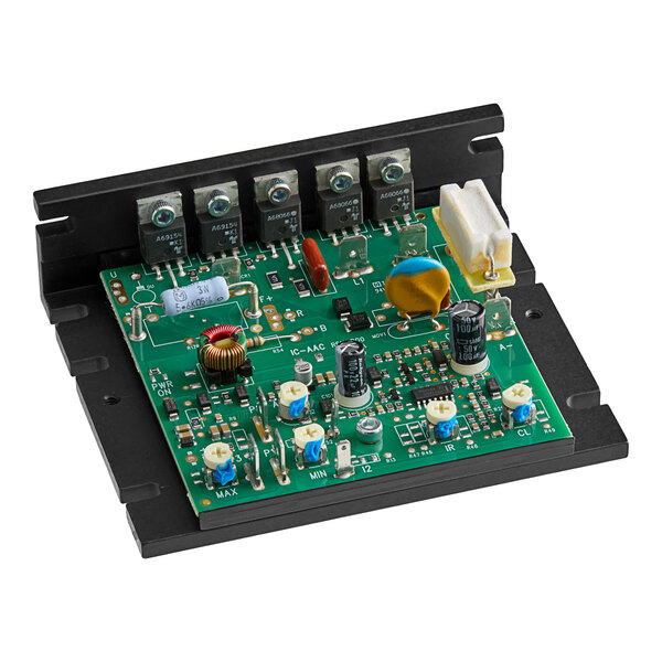 A green Hamilton Beach control board with many small electronic components.