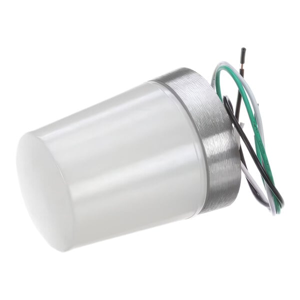 A cylindrical light assembly with a frosted cover, metallic base, and attached electrical wires.