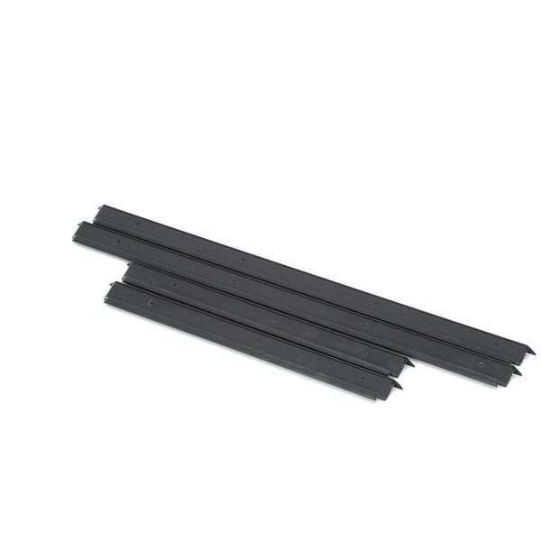 A set of black metal breaker strips.