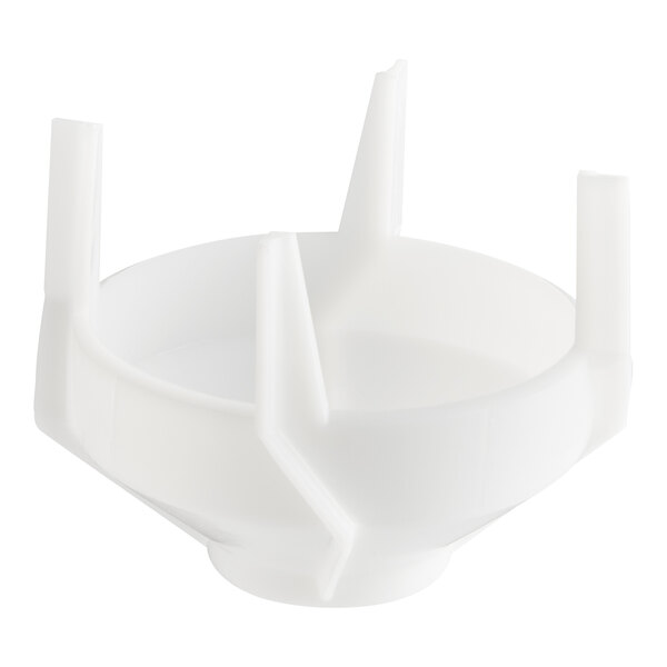 A white plastic bowl with four spikes.