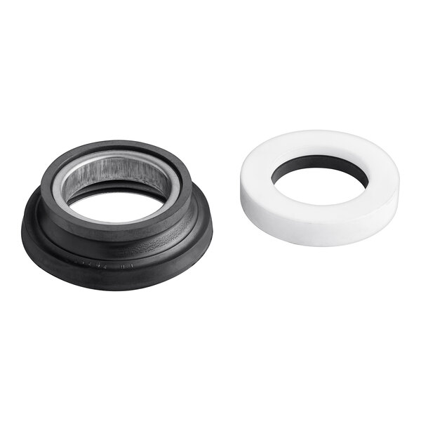 A white and black rubber seal with a white ring around it.