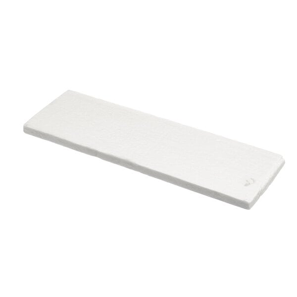 A white rectangular insulating Cleveland Flue Adapter.