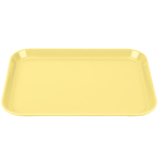 a yellow rectangular tray on a white background