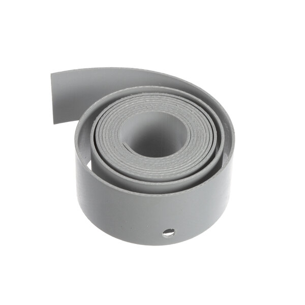 A close-up of a roll of grey rubber tape.