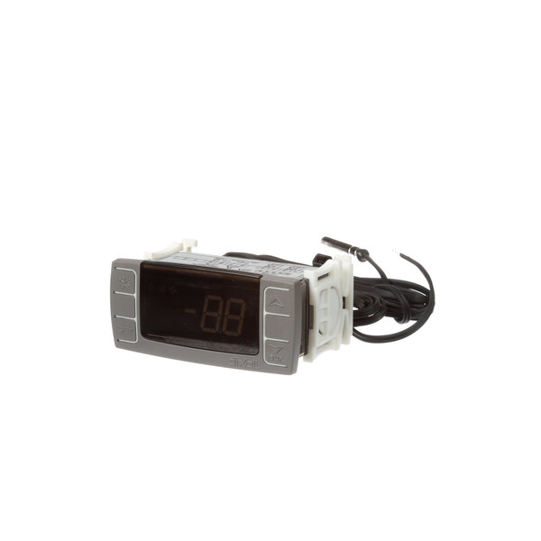 A True Refrigeration digital temperature controller with a wire.