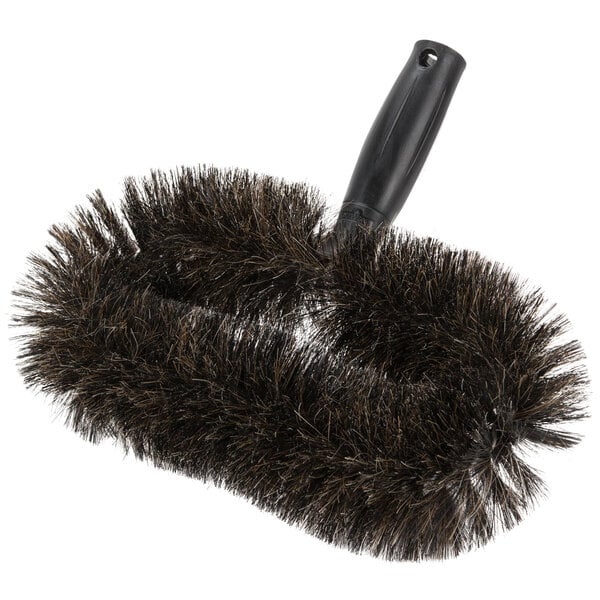 A close-up of a black Unger StarDuster brush with a handle.