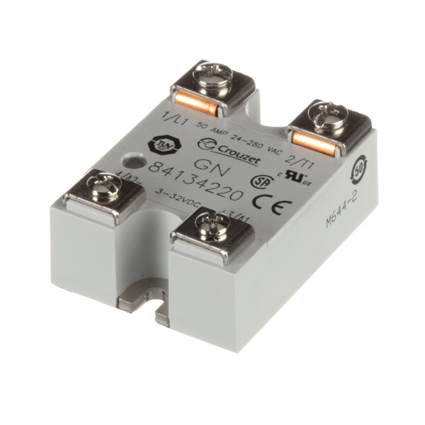 A close-up of a small white Antunes relay.