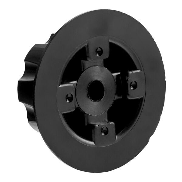 A black, round, plastic control knob with a central hole and four screw holes, likely used for temperature adjustment on an appliance.