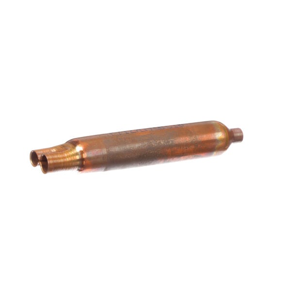 A close-up of a copper metal tube with a small hole in it.