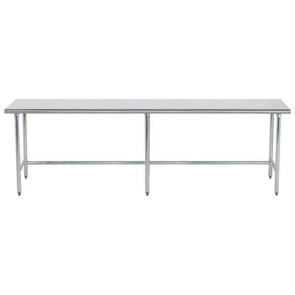 An Advance Tabco stainless steel work table with an open base and metal legs.