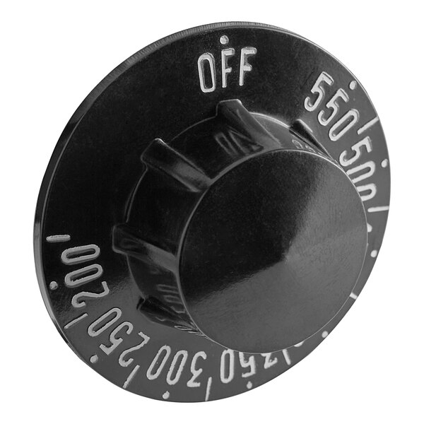 A black dial with white text on a Imperial thermostat knob.