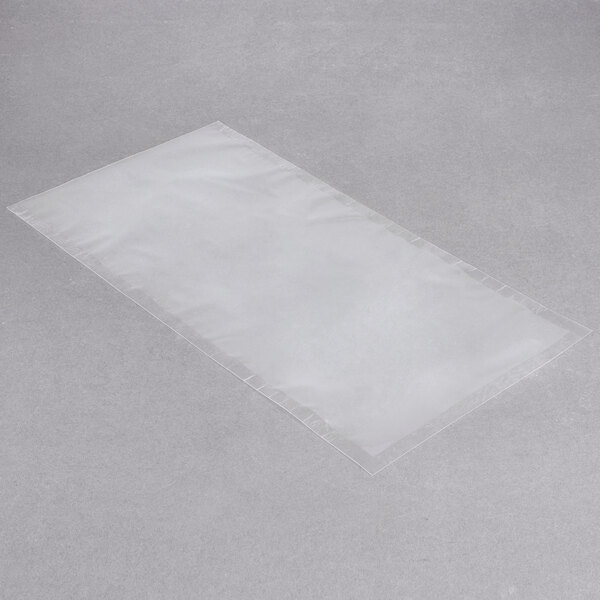 a white plastic bag on a grey surface