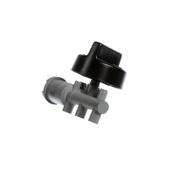 A grey plastic valve with a black cap.