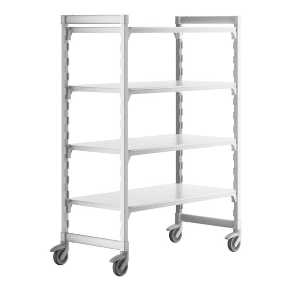 A white Cambro Camshelving Premium mobile shelving unit with 4 shelves on wheels.