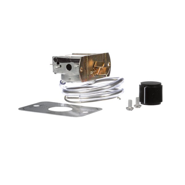 A Traulsen commercial refrigeration thermostat with a metal housing and screw.