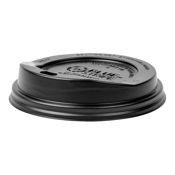 A black Eco-Products recycled content plastic lid on a table with a coffee cup lid.