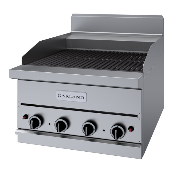 A Garland stainless steel natural gas charbroiler with ceramic briquettes.