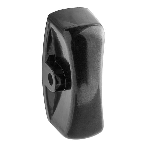 A close-up of a black plastic Garland range knob.