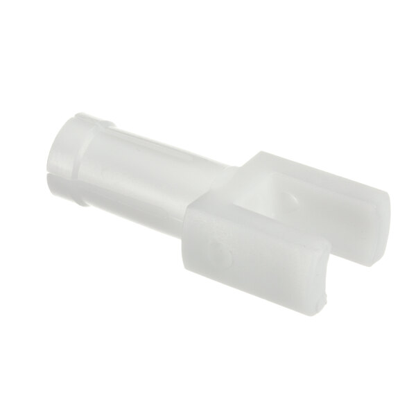 A close-up of a white plastic Taylor spinner drive connector.