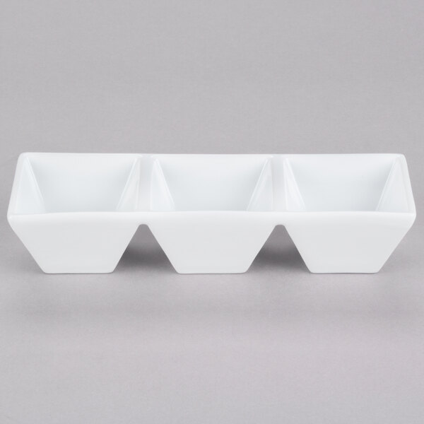 A CAC Citysquare white porcelain bowl divided into three compartments.