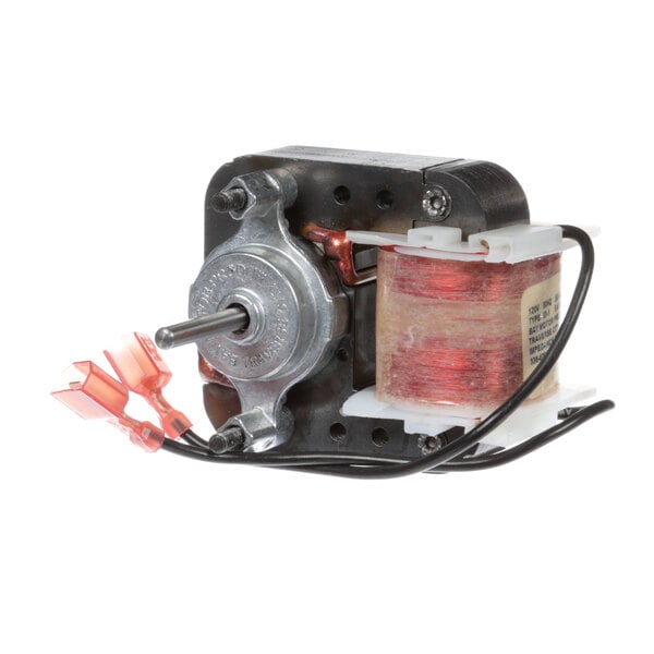 A Traulsen fan motor with wires attached.