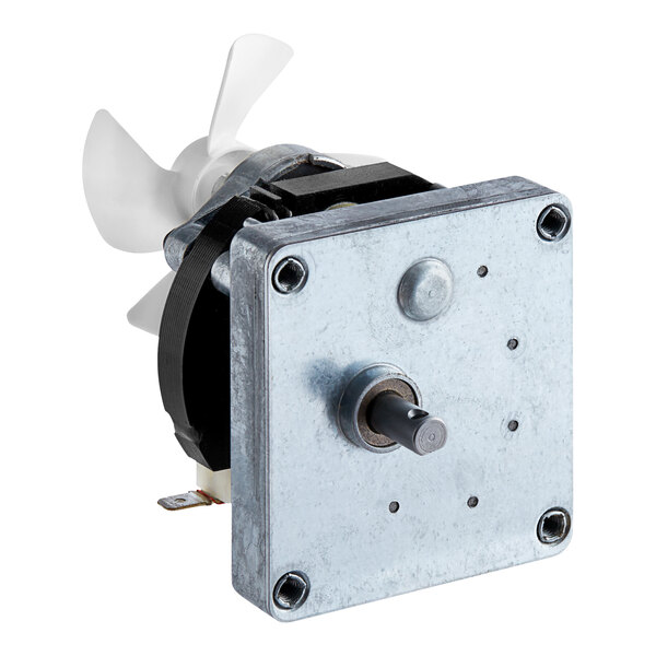 A metal square with a round metal object on top.