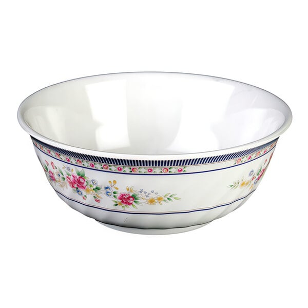 A white melamine bowl with a rose design on it.