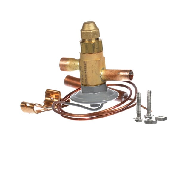 A copper Hussmann expansion valve with brass fittings.