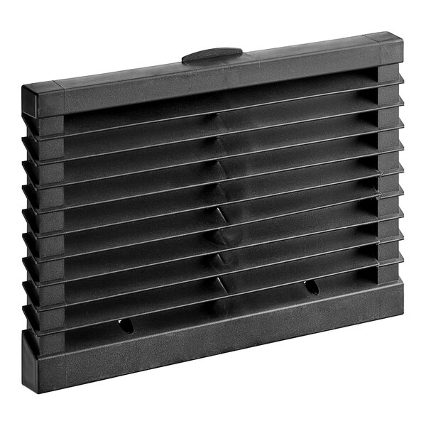 A black plastic Ice-O-Matic front grille with four rows of vents.