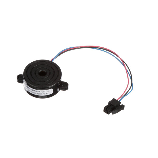 A small black circular beeper with wires.