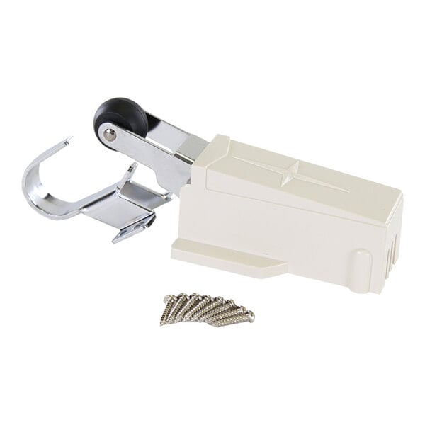 A metal and plastic door closure device with a roller and mounting screws.