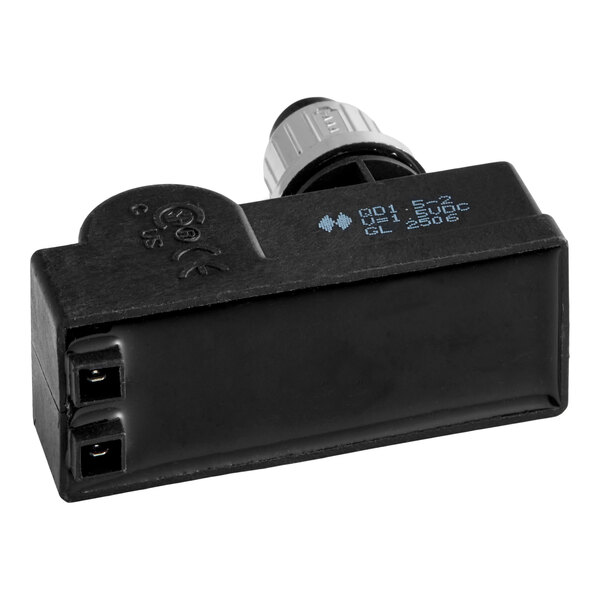 A black Southbend 1189810 spark ignitor with a connector and printed specifications on the casing.