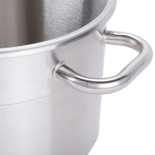 A stainless steel bowl assembly with handles.