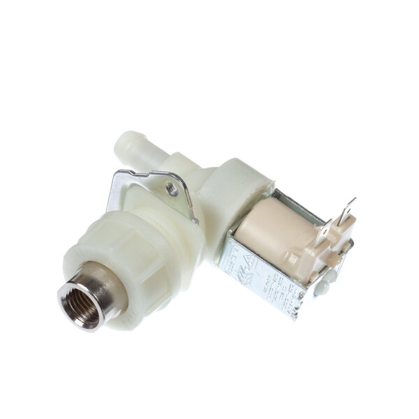 A close-up of a white Wells solenoid valve with a metal square.