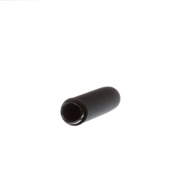 A close-up of a black foam tube with a hole.