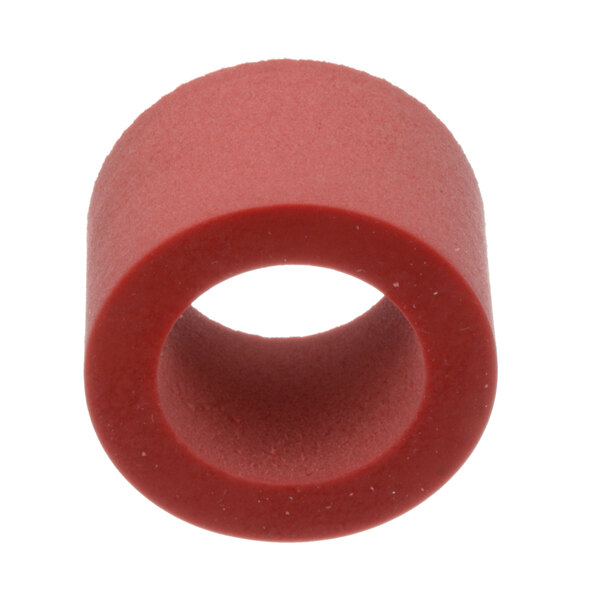 A close-up of a red Bizerba shock absorber sleeve with a hole in the center.