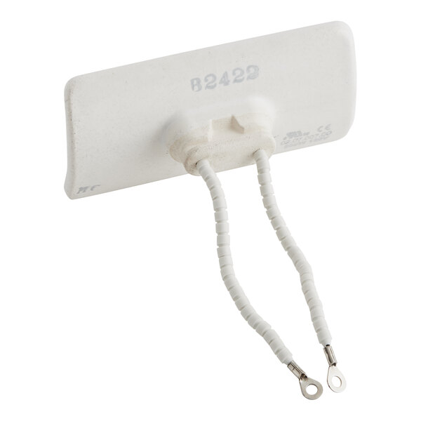 A white rectangular object with two wires attached to it.