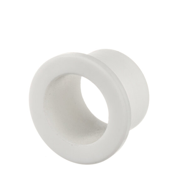 A close-up of a white plastic Champion 110341 bearing plug with a hole in it.