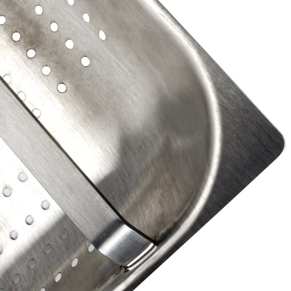 A stainless steel Advance Tabco pre-rinse basket with a handle.