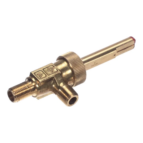 A close-up of a Southbend brass gas valve with a red tip.