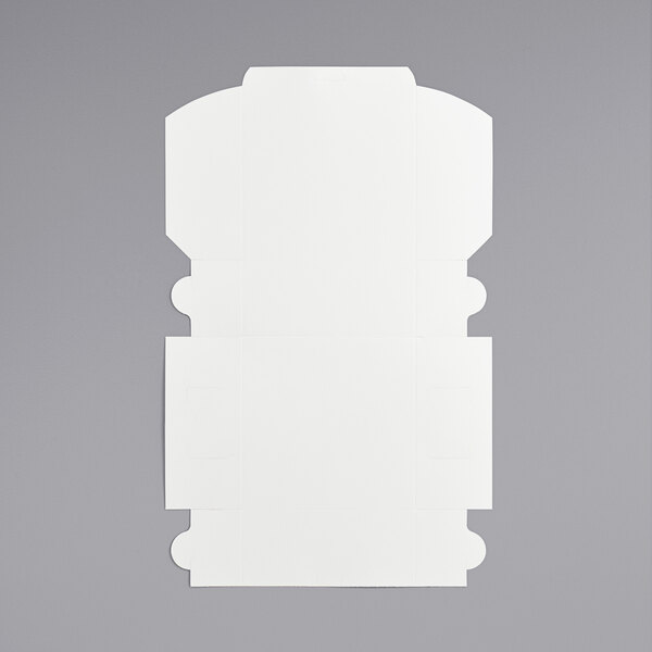 A white box with a cut out corner.