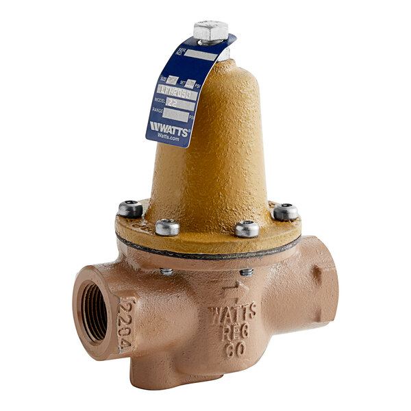 A brown and gold Hatco pressure reducing valve with a blue label.