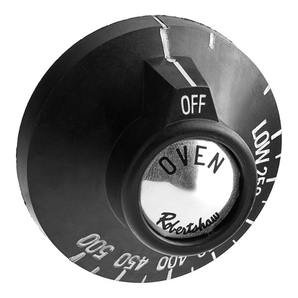 A round black Vulcan dial with white text that says "Oven"