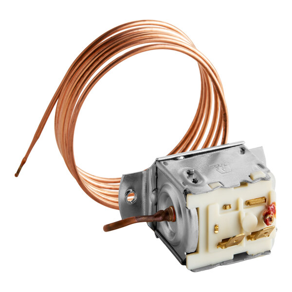 A metal and plastic mechanical component with a coiled copper tube attached.