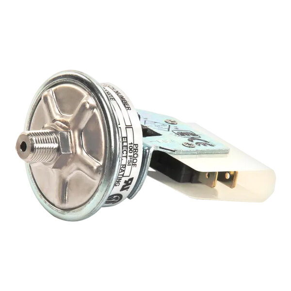 A metal and plastic pressure switch component with a threaded connector and electrical terminals.
