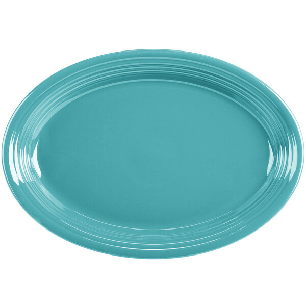 A turquoise oval platter with a white background.