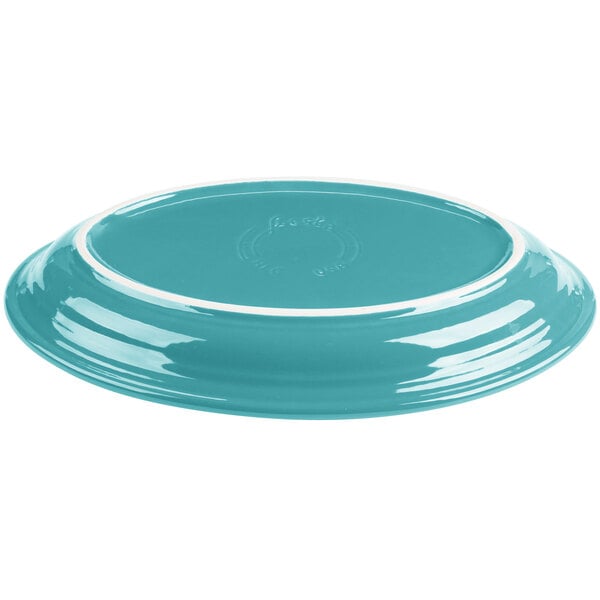 A turquoise Fiesta china platter with a white rim.