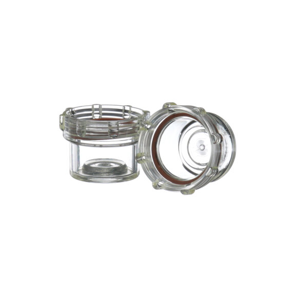 Two clear glass Prince Castle strainer caps with brown gaskets.